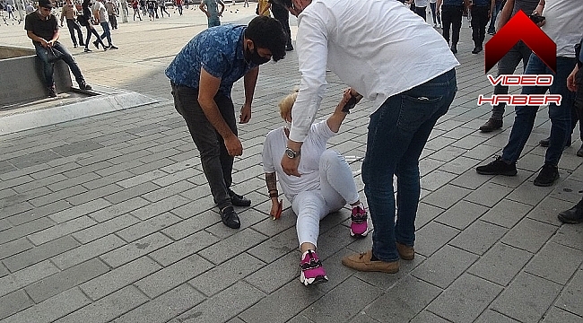 Taksim'de 2 erkek, bir kadını böyle darp etti