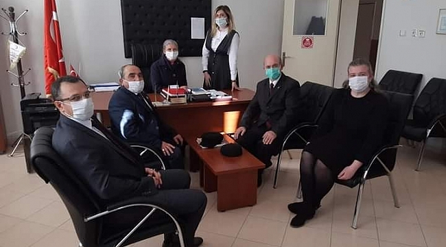 Çifteler'de muhtarların Öğretmenler Günü ziyaretleri