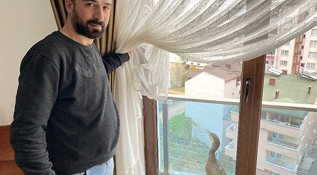 Balkonda mahsur kalan karabatak kuşu kurtarıldı