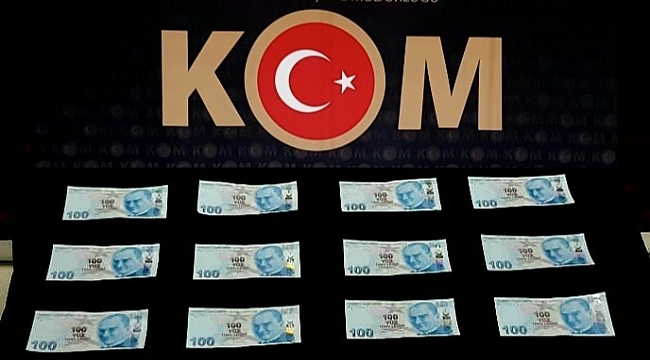Pazarda sahte parayla alışveriş yaparken yakalandılar