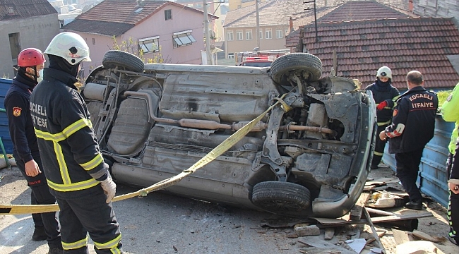 Devrilen otomobilden burnu bile kanamadan çıktı