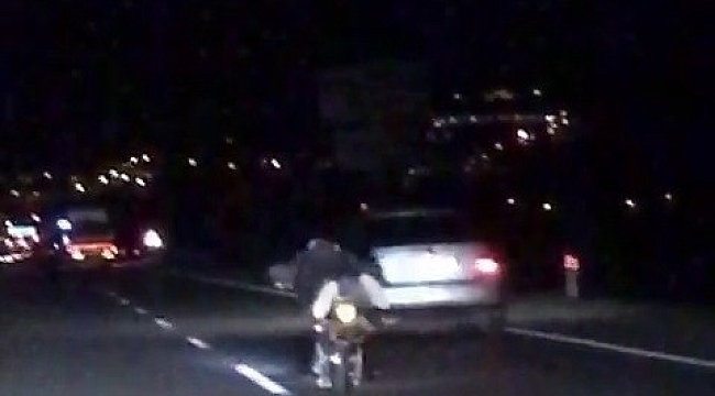 Seyir halindeki motosikletin üzerine yatan sürücü ölümle dans etti