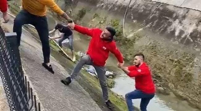 Su kanalına düşen köpek insan zinciriyle kurtarıldı