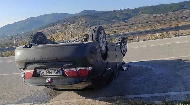 Takla atan otomobilden yaralı kurtuldu