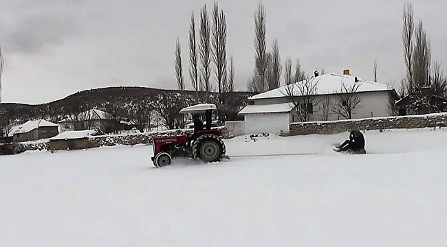 Traktör tekeri ile kayak keyfi