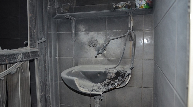 Uyumayan komşu esnafın ekmek teknesini kurtardı