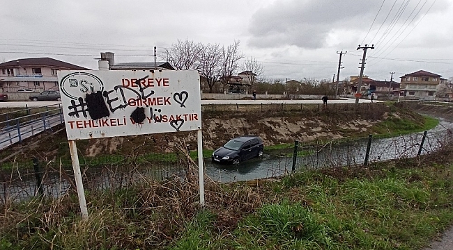 Dereye uçan otomobilden burnu kanamadan çıktı