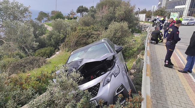 Ehliyetsiz sürücü şarampole uçtu; 2 yaralı
