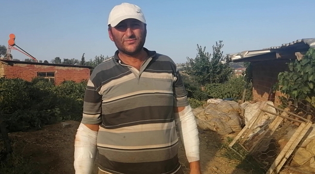 Yangına su taşıdığı traktörü alevler arasında kaldı