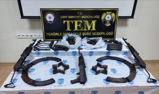 Moloz yığınları altına gizlenmiş silah ve mühimmat bulundu