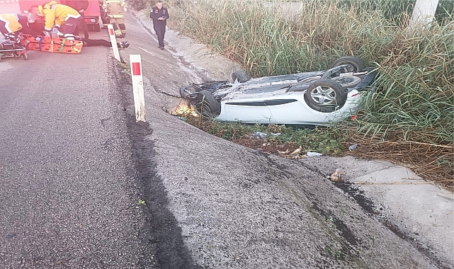 Bursa'da sulama kanalına devrilen otomobilin sürücüsü yaralandı