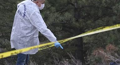 Annenin cesedi toprağa gömülü, oğlu da silahla vurulmuş halde bulundu