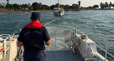 Karaya oturan gezi teknesindeki 9 kişi kurtarıldı